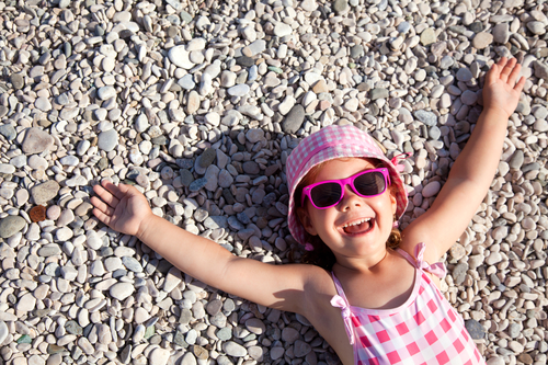 happy little girl on beach