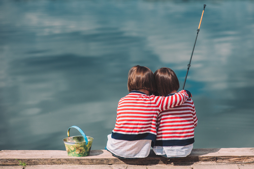 Twin sisters on Wooden pier