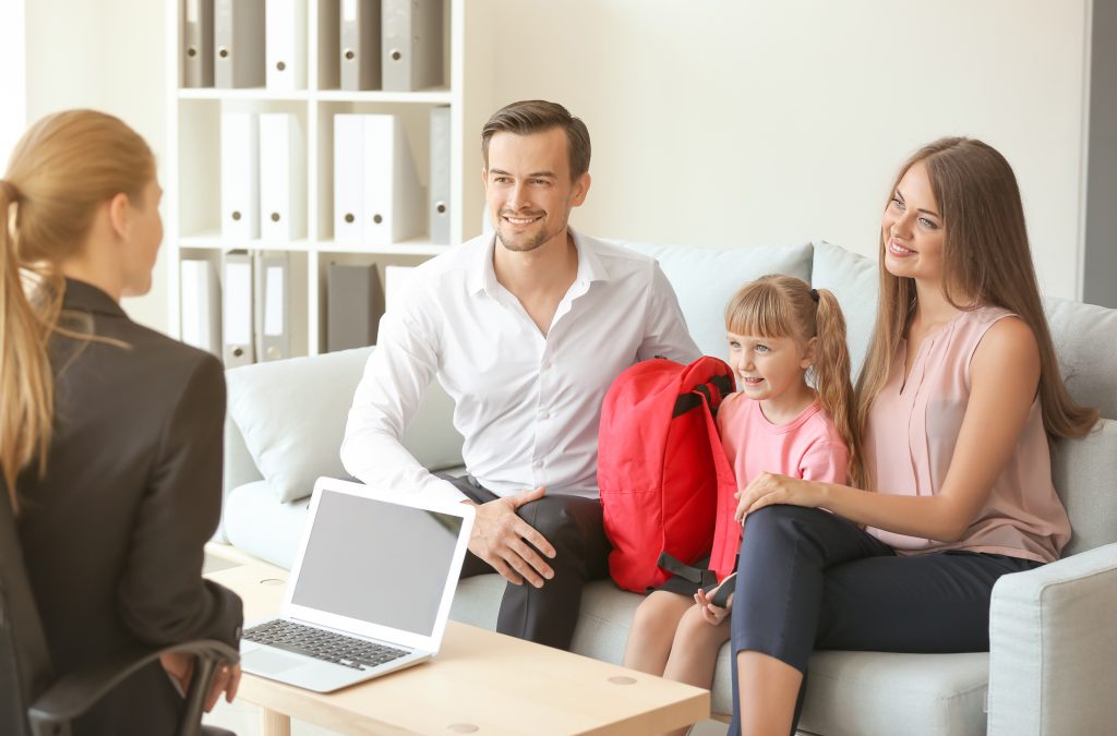 parent and teacher with child