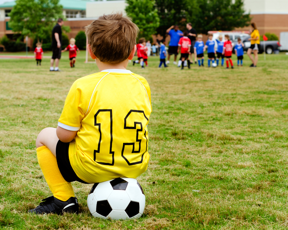 boy watching soccer